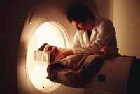 Billede af en patient i en scanner Billede af en patient i en scanner